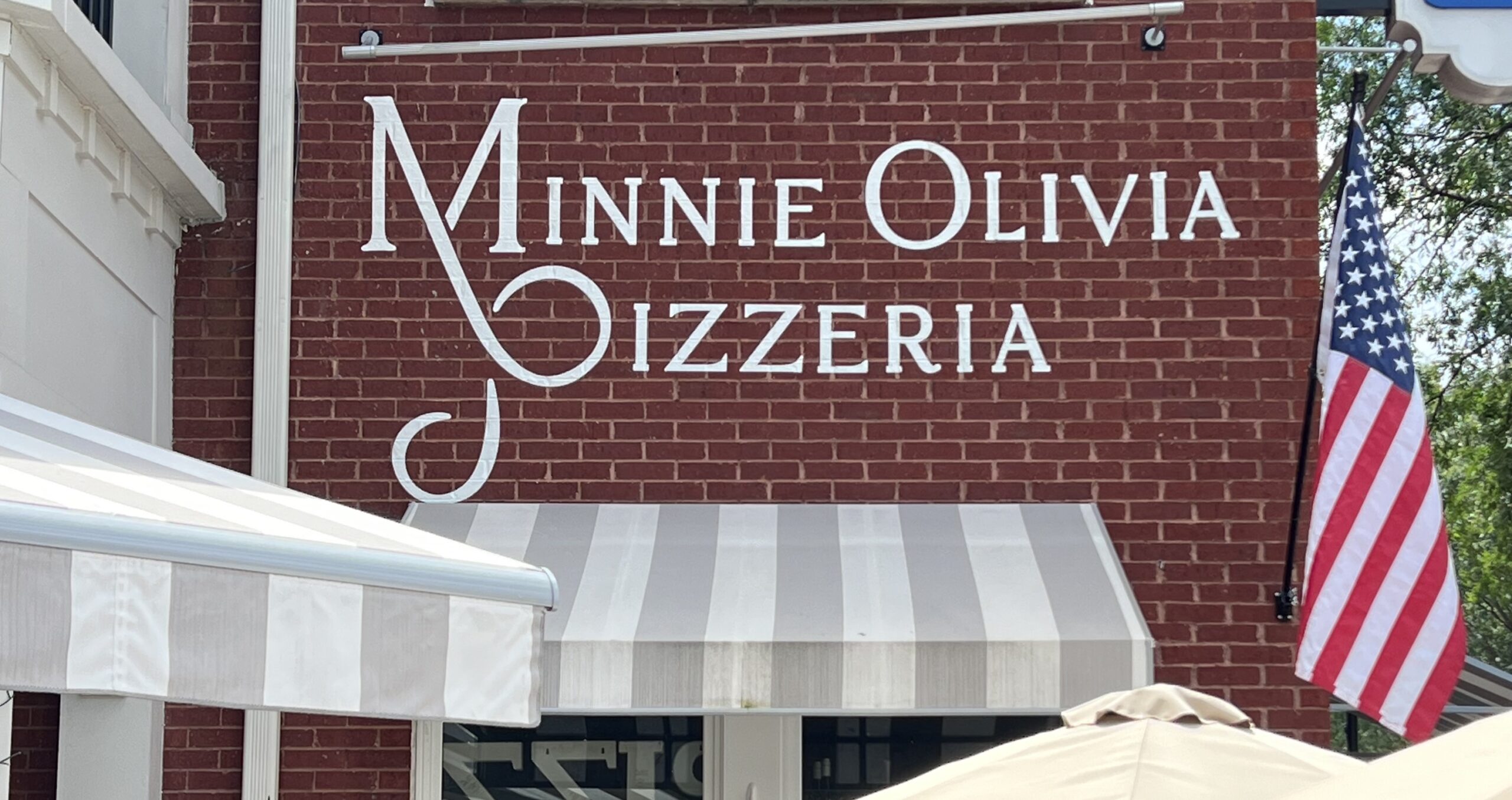 Minnie Olivia Pizzeria restaurant sign in Georgia