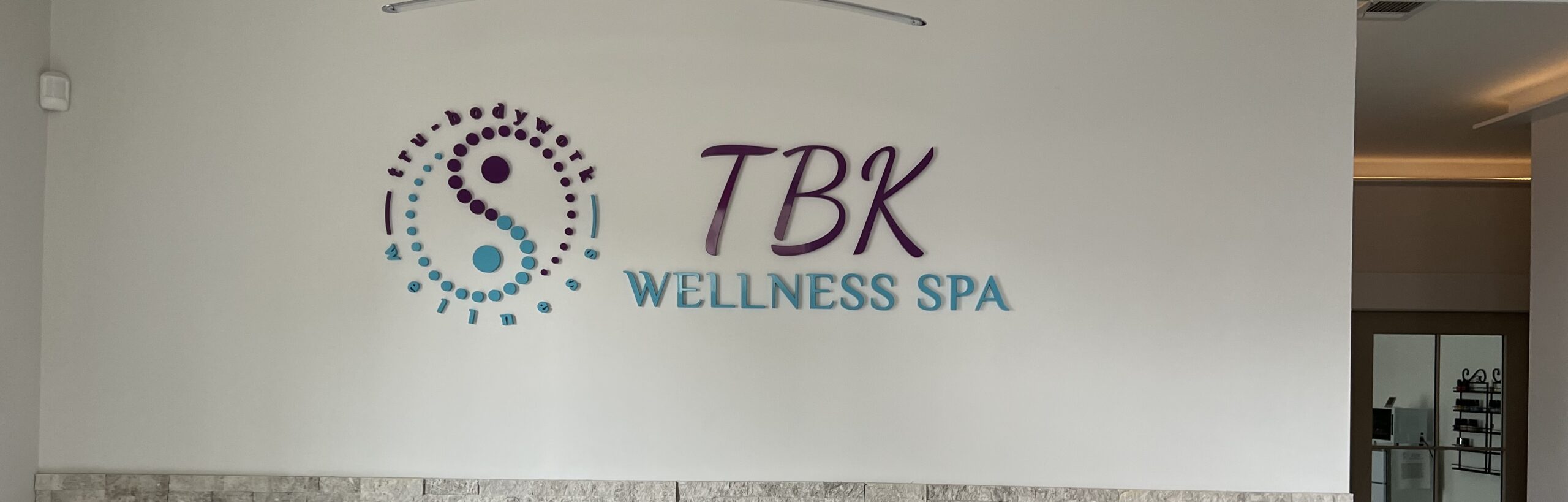 TBK Wellness Spa lobby sign in Georgia