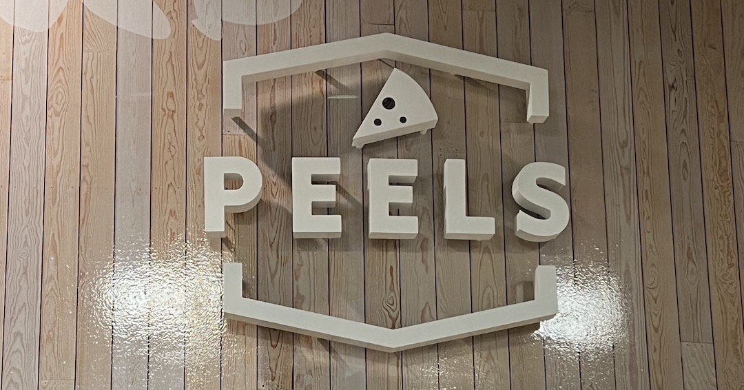 logo sign for Peels Pizza Georgia