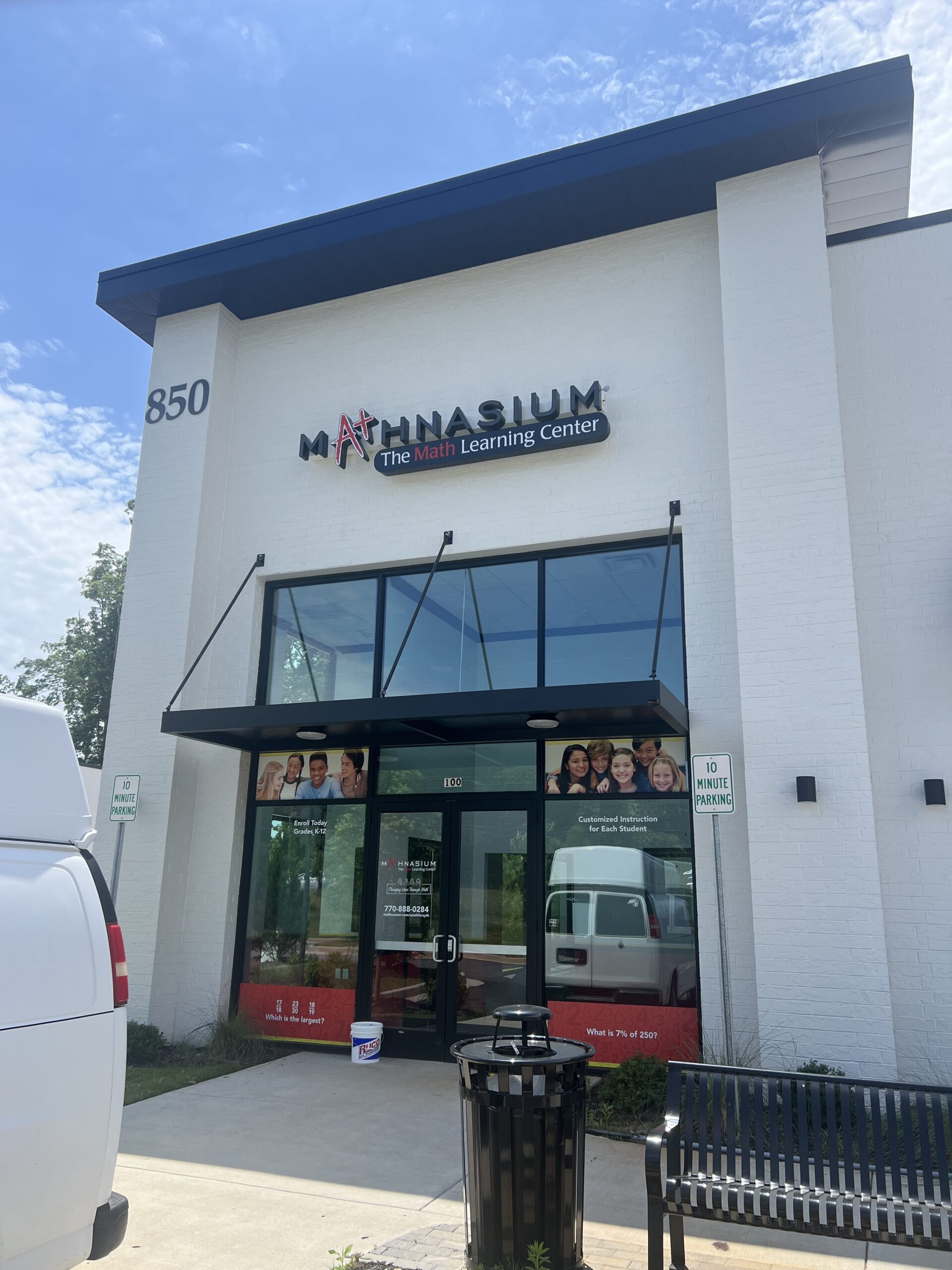 LED-illuminated channel letter sign for Mathnasium, mounted on a raceway above the storefront in Cumming, GA.